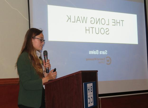 photo of student Sara Bales presenting a presentation at an archaeology conference